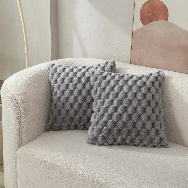 Décoration maison: Housse de coussin en peluche douce, apportant confort et style à votre chambre.