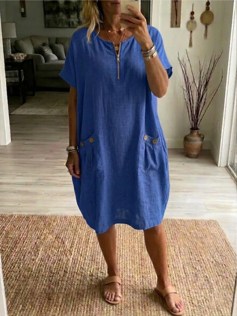 Robe femme Tessa décontractée et confortable, avec fermeture éclair avant, idéale pour printemps/été. Style casual chic.