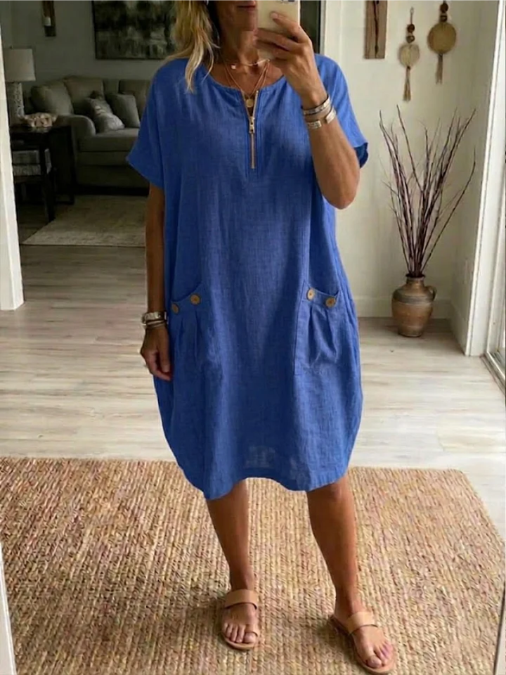 Robe femme Tessa décontractée et confortable, avec fermeture éclair avant, idéale pour printemps/été. Style casual chic.