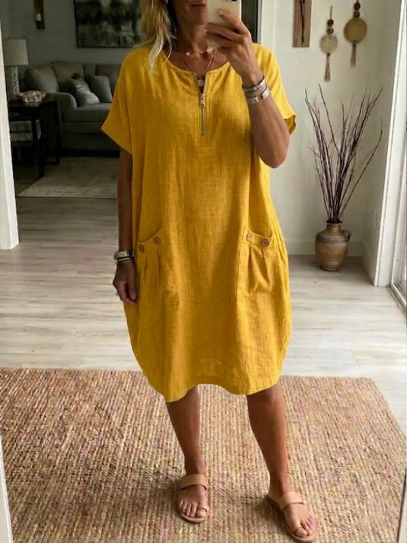 Robe courte Tessa décontractée pour femme, parfaite pour l'été et le printemps. Style casual polyvalent et chic.