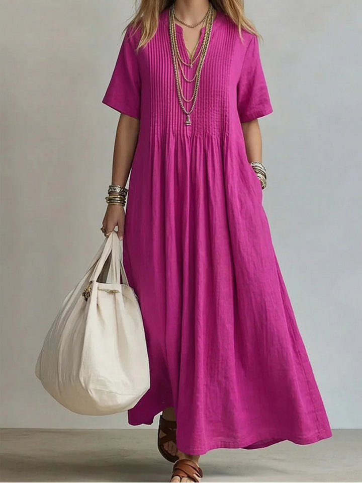 Robe maxi fluide femme en coton lin, style décontracté chic pour printemps-été.