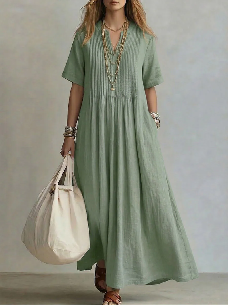 Robe longue femme chic et décontractée, col V. Tissu fluide parfait pour le printemps/été. Confortable et élégante.