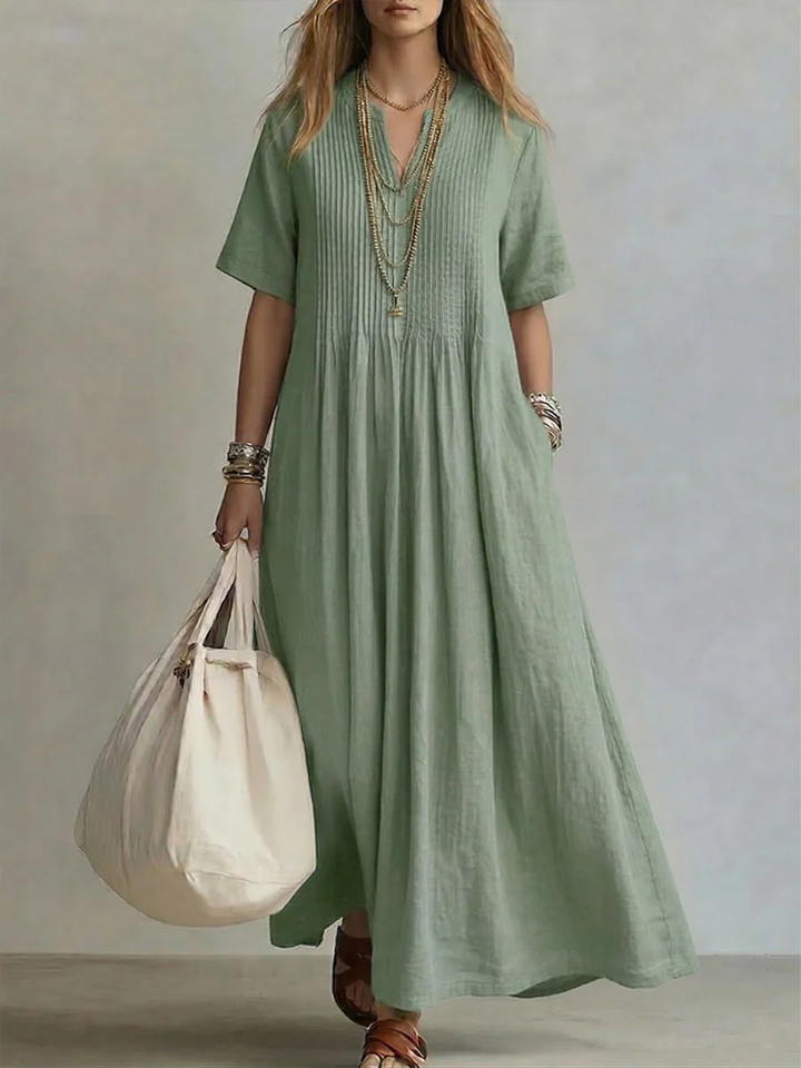 Robe longue femme chic et décontractée, col V. Tissu fluide parfait pour le printemps/été. Confortable et élégante.
