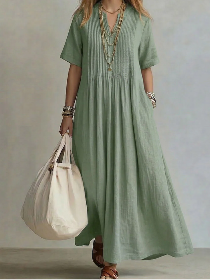 Longue robe fluide femme en coton lin confortable, style bohème chic d'été.