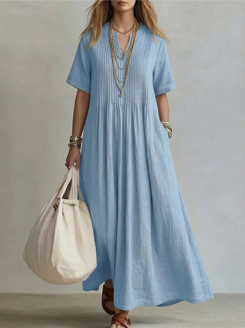 Robe fluide femme en coton, coupe maxi, col V. Vêtement d'été confortable et léger, disponible en grande taille.