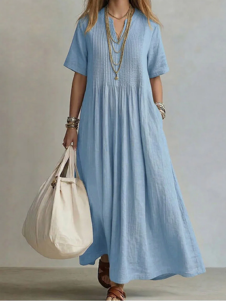 Élégante robe maxi décontractée femme en coton lin, parfaite pour le printemps et l'été.