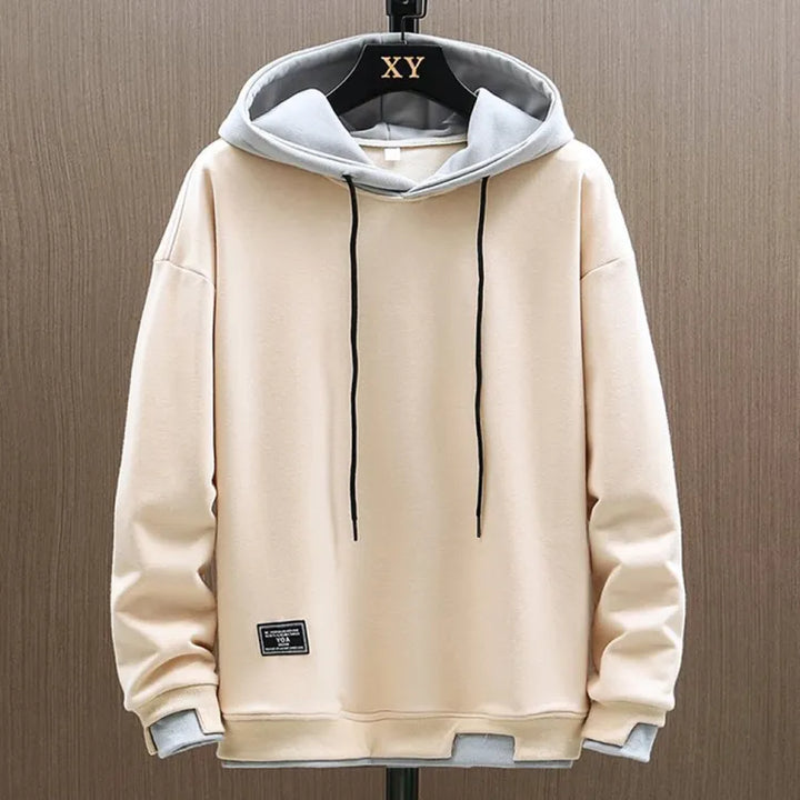 Hoodie homme décontracté, tissu doux, capuche ajustable. Confort optimal, style casual polyvalent pour le quotidien.