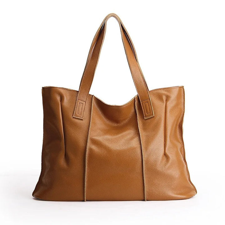 Grand sac bandoulière en cuir pleine fleur, parfait pour étudiantes et professionnelles organisées.