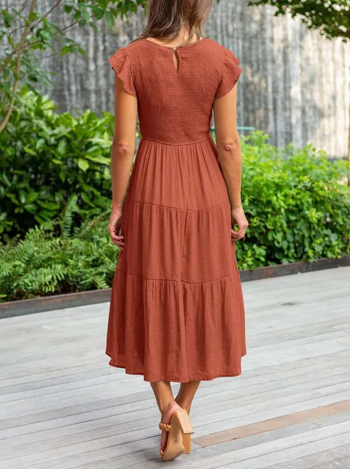 Robe chic et polyvalente pour femme, coupe avantageuse ventre plat. Confort et élégance assurés.