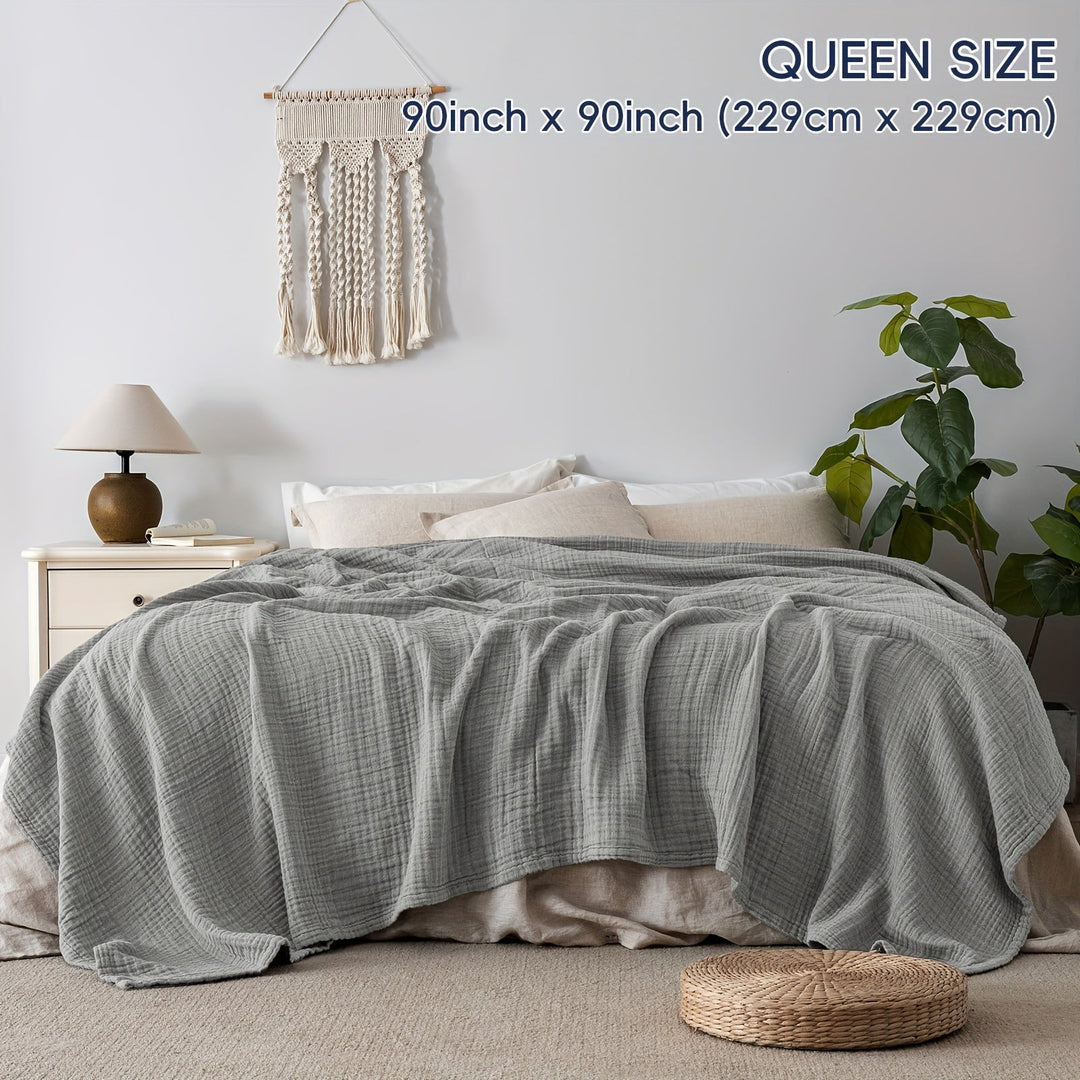 Plaid blanc pur en coton Cloudsoft, linge de lit parfait pour une ambiance sereine.
