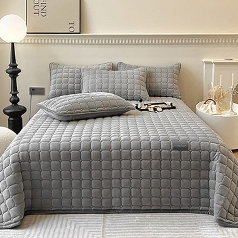 Couverture de lit moderne, douce et confortable, texture carrée, parfait pour une chambre luxueuse.