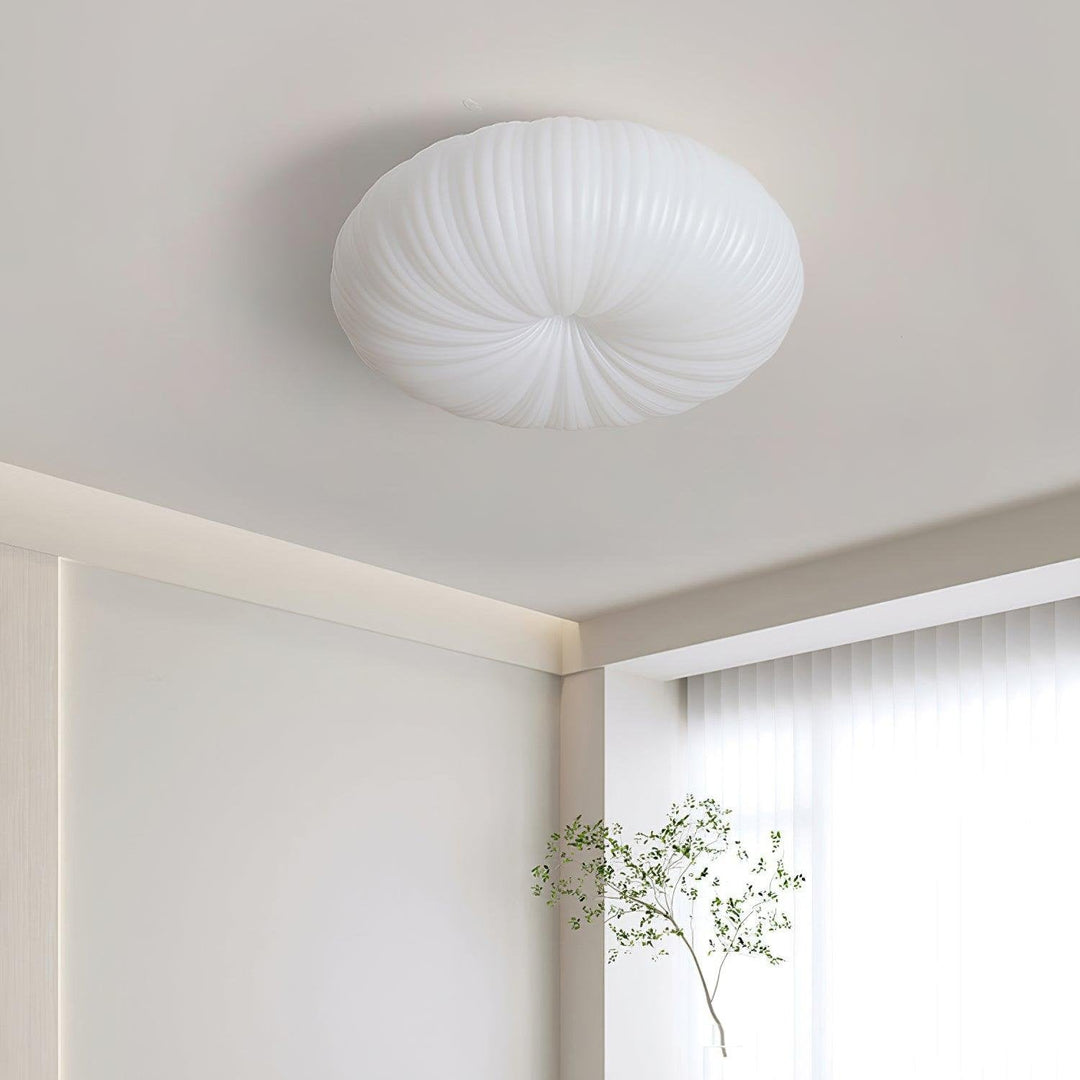 Plafonnier design Filomena, éclairage LED dimmable pour une ambiance moderne et chaleureuse.