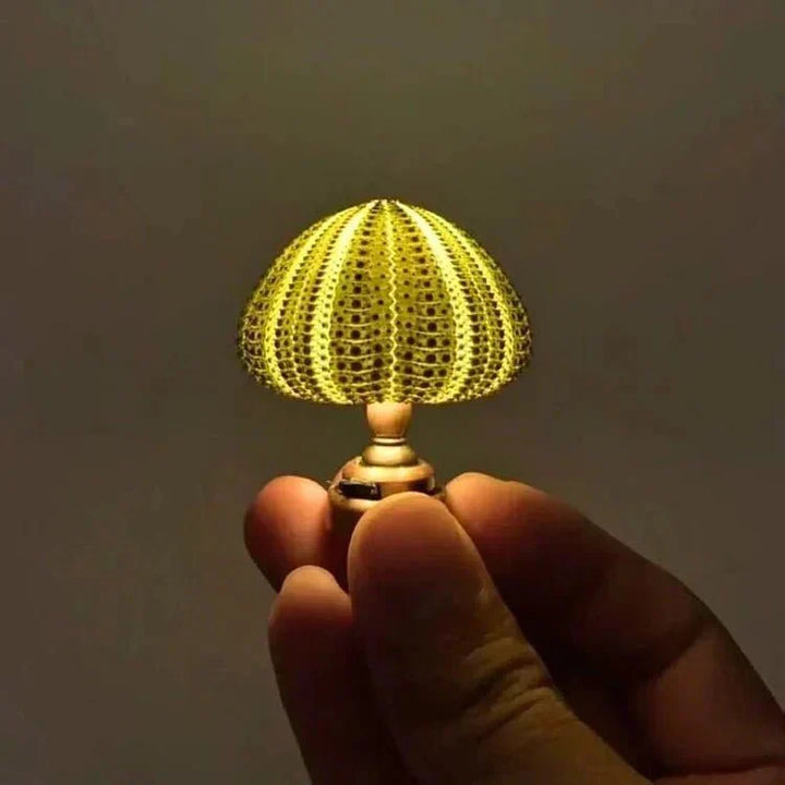 Oursin lumineux LED pour table, fait main, crée une ambiance moderne et créative.