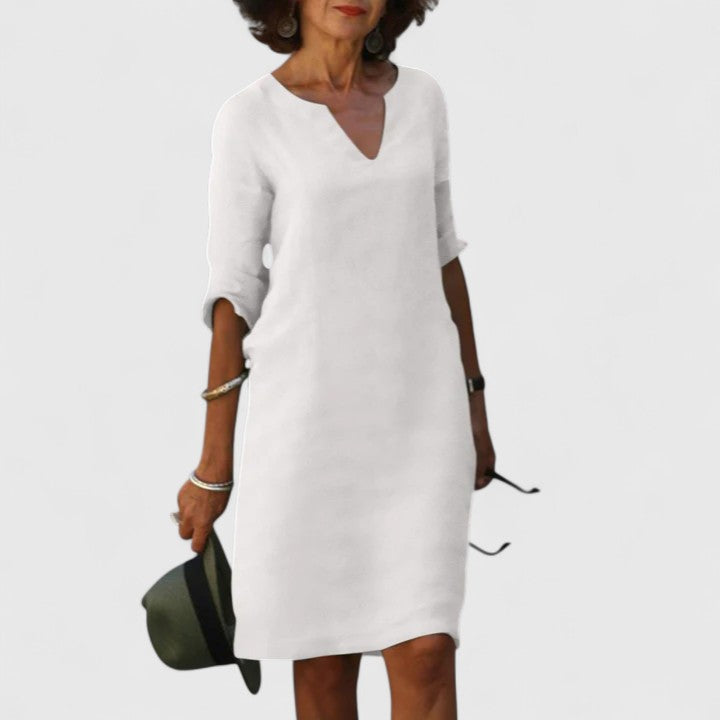 Robe polyvalente femme, confortable à col V, parfaite pour un confort quotidien et une élégance décontractée.