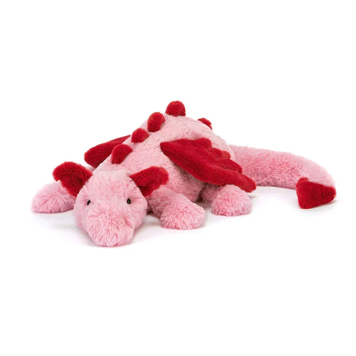 Peluche dragon douce au toucher, parfaite pour les câlins. Un jouet enfant confortable et unisexe de qualité.