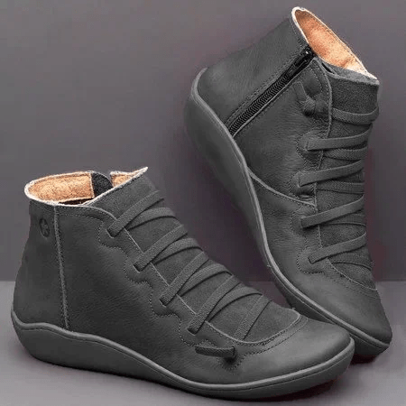 Paire de bottes confortables pour hommes, fabrication artisanale offrant un soutien optimal toute la journée, style intemporel.