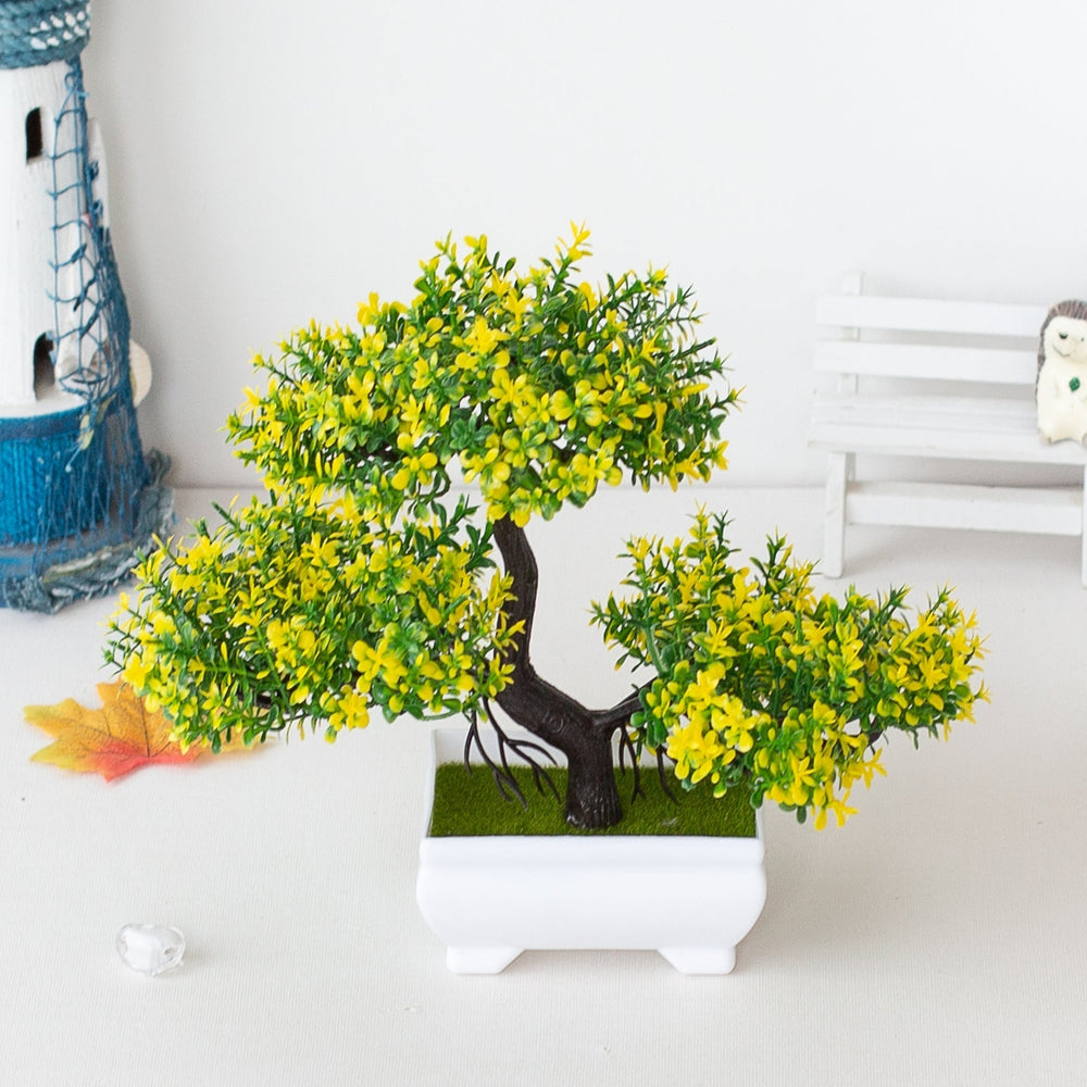 Bonsaï artificiel vert pour une touche zen. Décoration intérieure élégante et sans entretien pour maison ou bureau.
