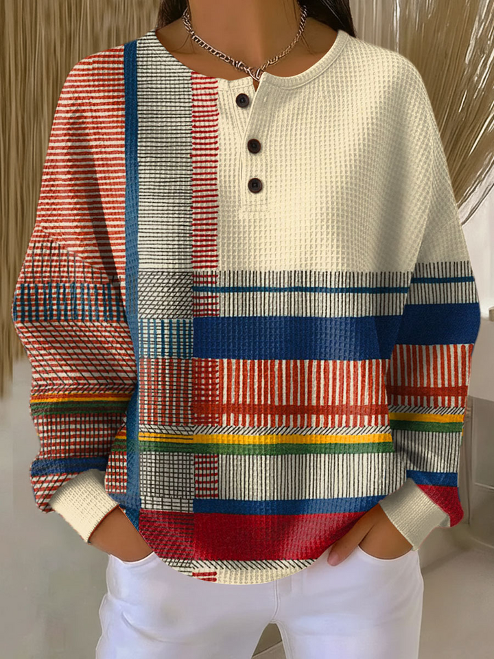 Pull femme chaud en tricot gaufré, vêtement confortable et stylé.