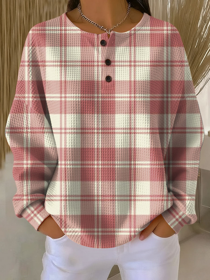Motif gaufré du pull femme, tricot chaud pour un confort hivernal optimal.