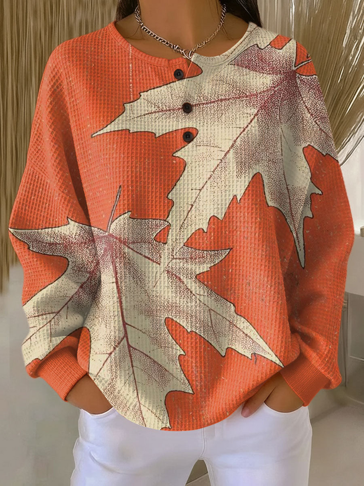 Pull femme tendance hiver, tricot gaufré élégant et confortable.