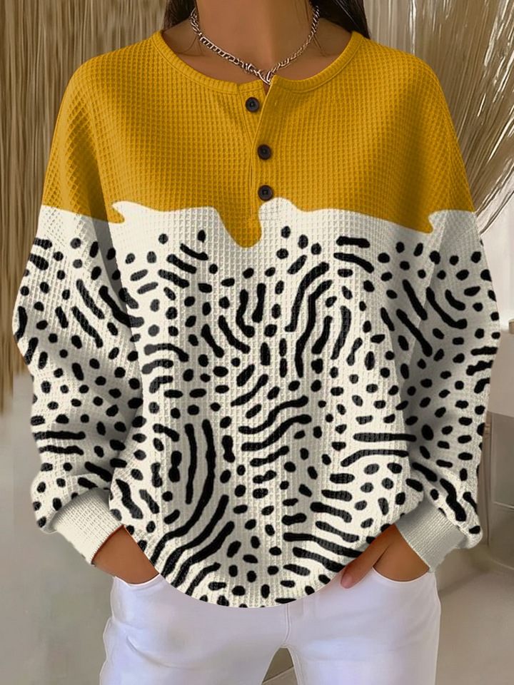 Pull femme douillet et chaud en tricot gaufré, parfait pour rester au chaud en hiver.