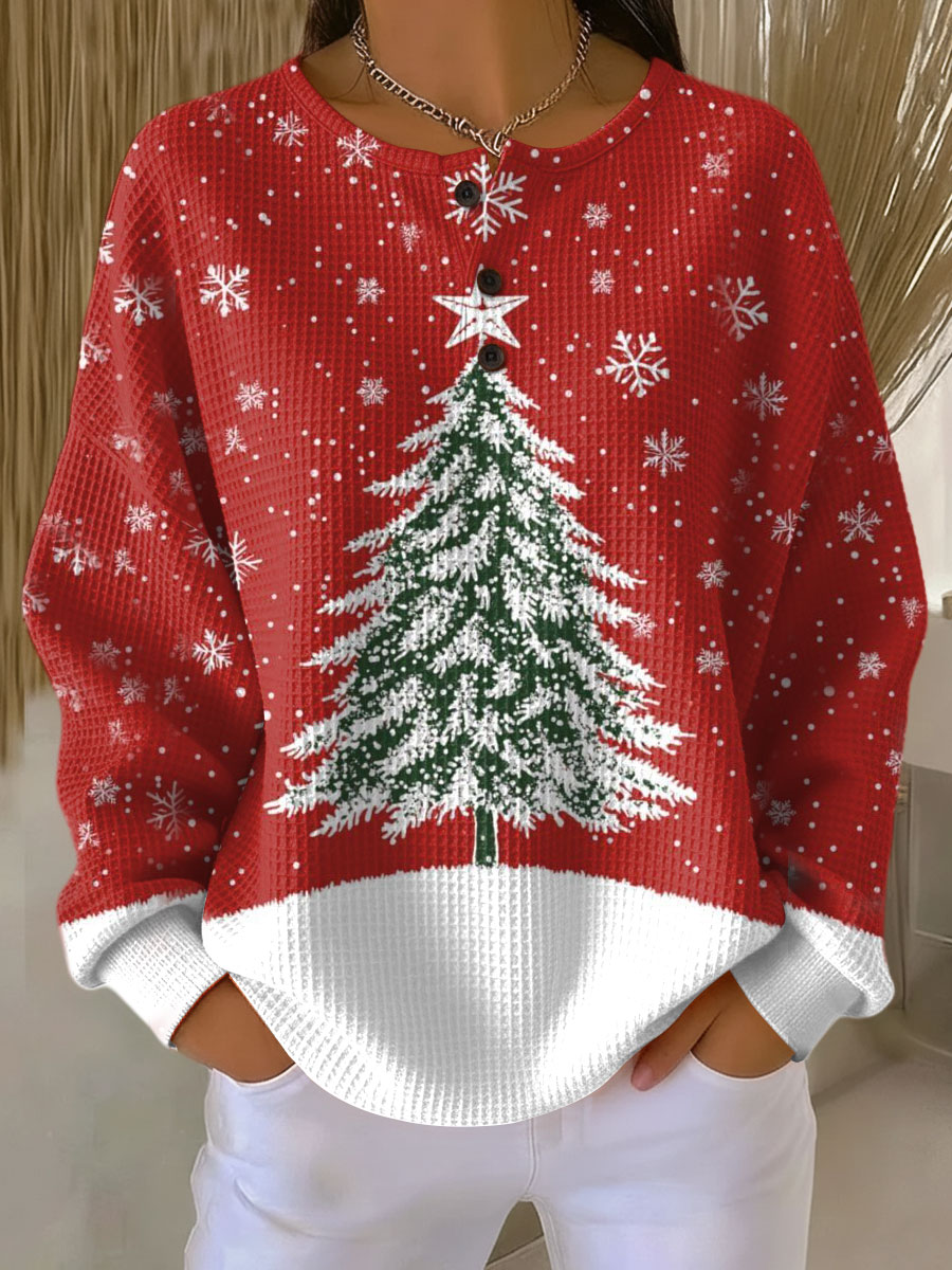 Élégant pull femme en tricot gaufré, chaud et moderne pour un look hivernal.