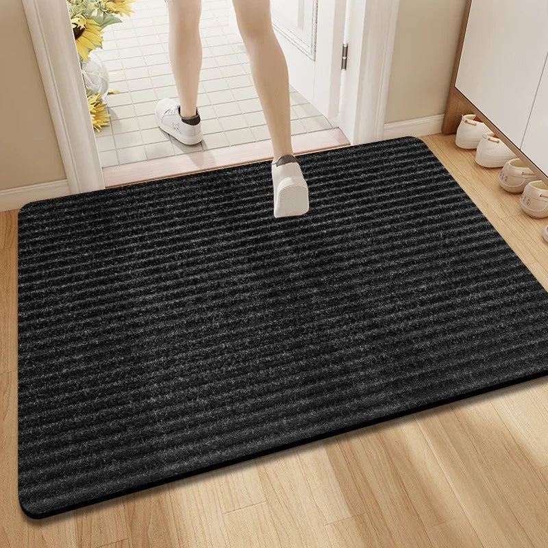 Tapis d'entrée HydroGuard en polyester résistant, facile à nettoyer. Antidérapant, parfait pour cuisine ou hall d'entrée.
