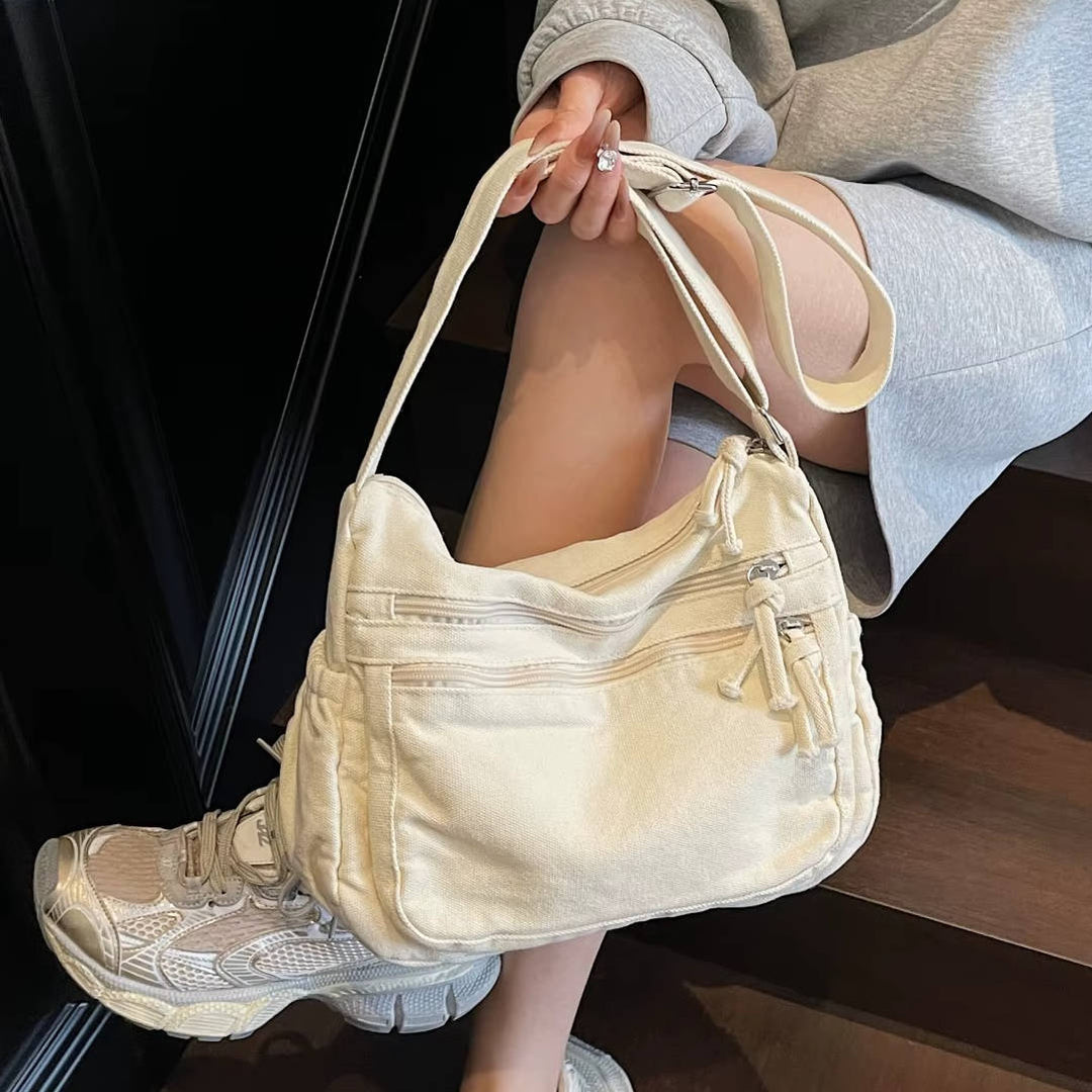 Sac à bandoulière en toile pour femmes, multi-poches. Parfait pour le quotidien et une organisation compacte.