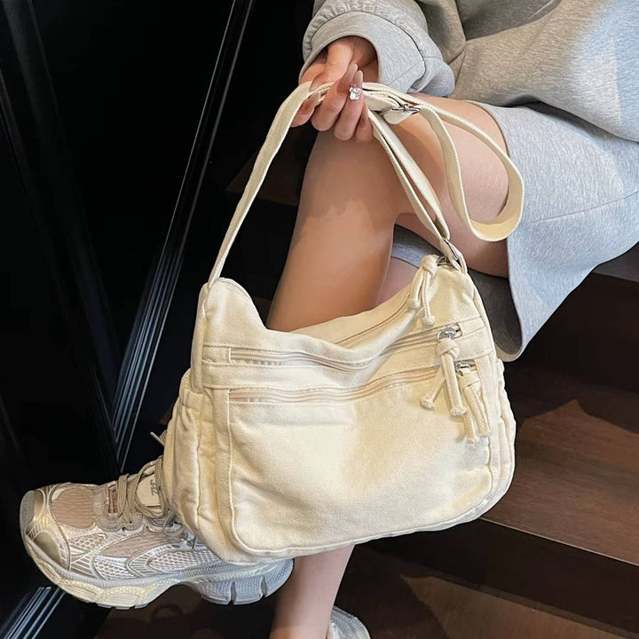 Sac à bandoulière en toile pour femmes, multi-poches. Parfait pour le quotidien et une organisation compacte.