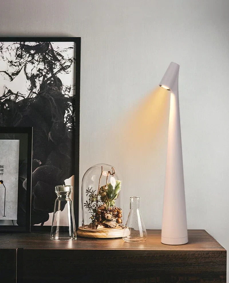 Éclairage d'ambiance LED portable, lampe de table design, sans fil et rechargeable pour décoration intérieure.
