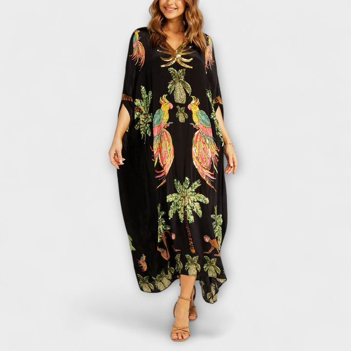 Robe longue femme asymétrique élégante, imprimé cocotier tropical. Parfaite pour l'été et les vacances.