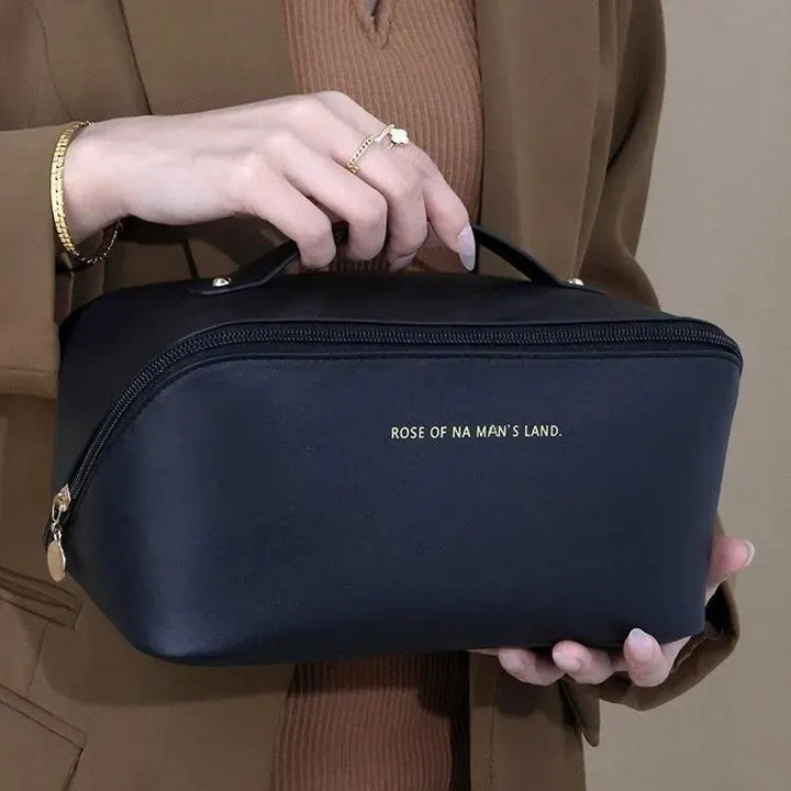 Organisateur de maquillage rose, solution de rangement portable avec fermeture éclair, pour cosmétiques femmes.