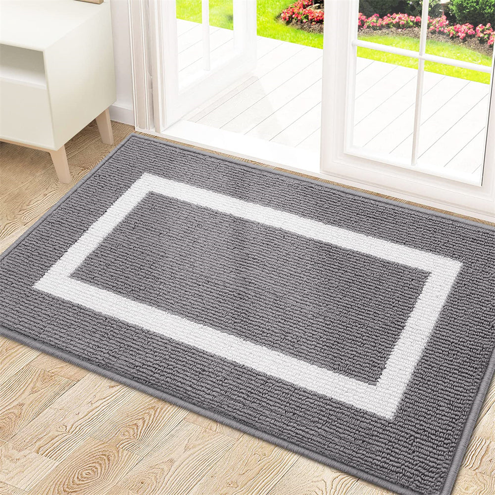 Grand tapis d'accueil résistant pour entrée, design moderne, antidérapant et anti-salissures pour un extérieur propre.