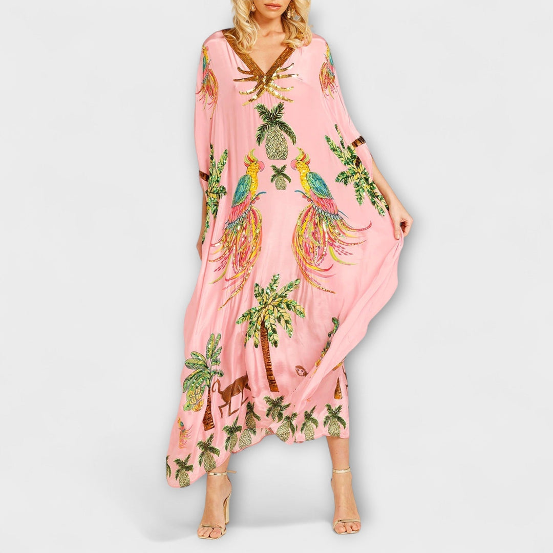 Superbe robe longue femme asymétrique, imprimé cocotier vibrant. Look estival pour vacances et sorties.