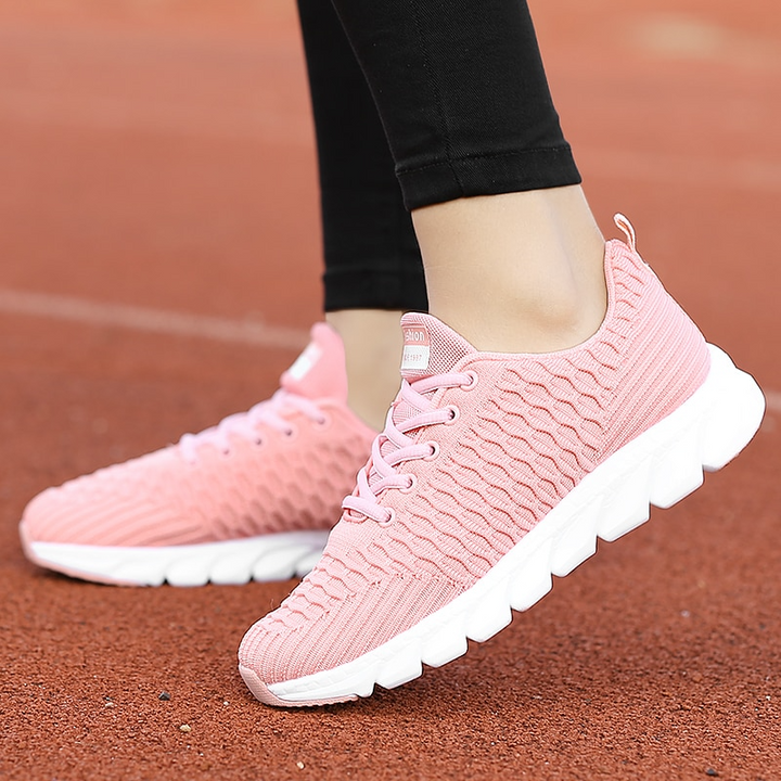 Chaussures de sport élégantes pour femmes, offrant un excellent confort et maintien. Idéales pour activités quotidiennes.