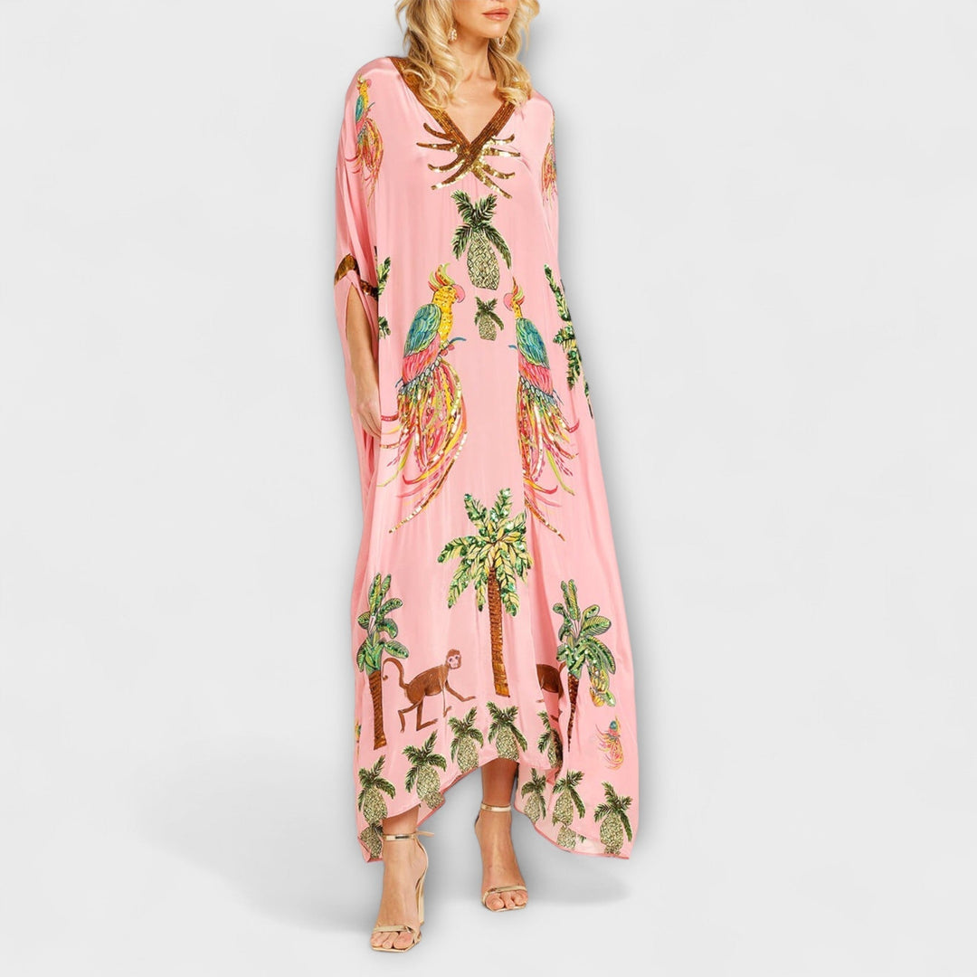 Robe maxi femme élégante et fluide, coupe asymétrique, motif cocotiers. Confort et style pour l'été.