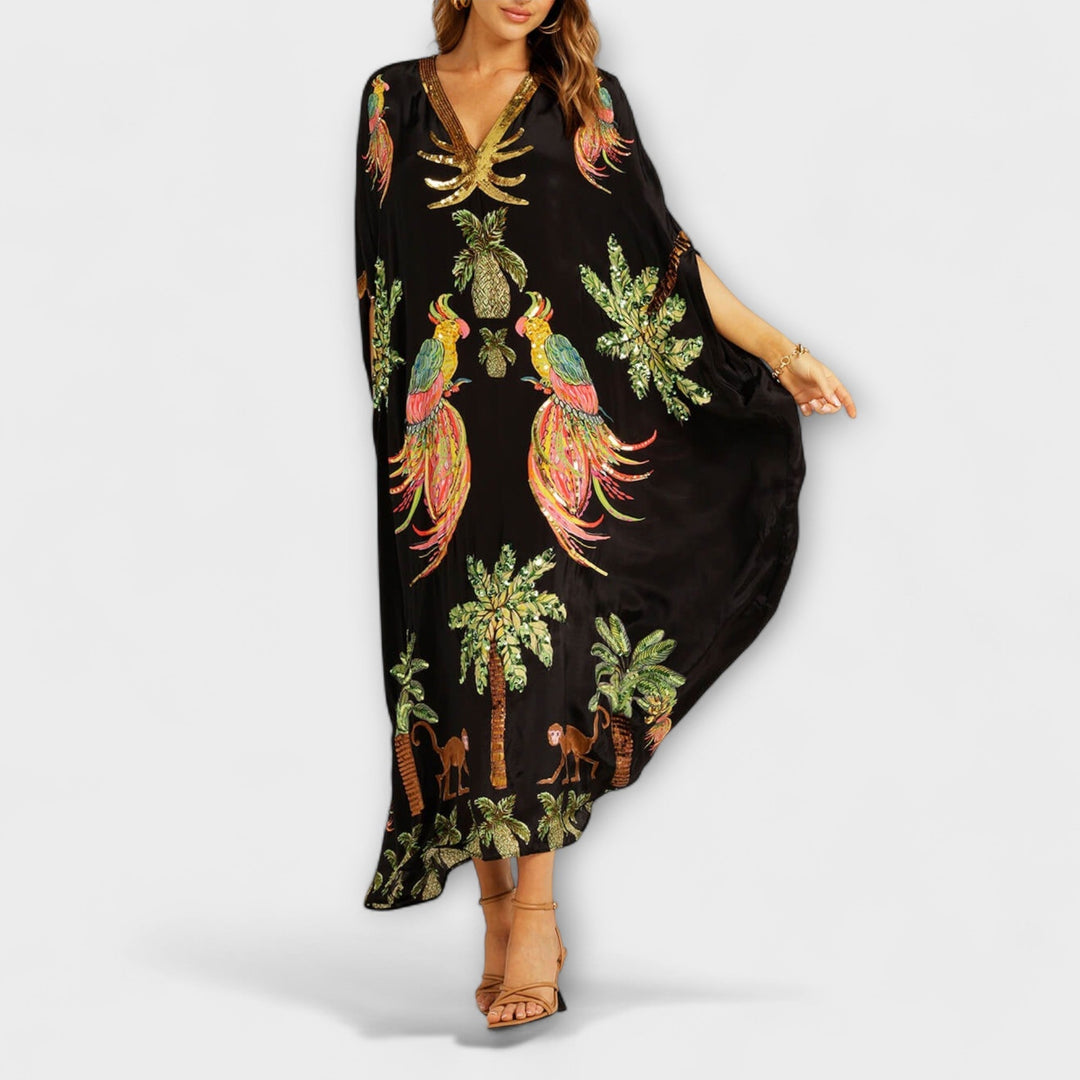 Robe longue femme asymétrique, élégant imprimé cocotier. Parfaite pour les soirées d'été et la plage.