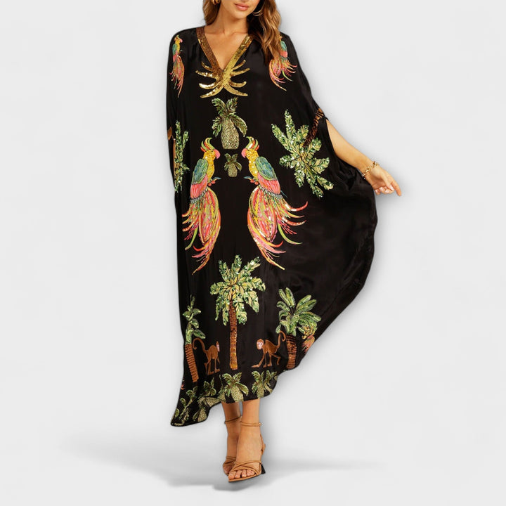 Robe longue femme asymétrique, élégant imprimé cocotier. Parfaite pour les soirées d'été et la plage.