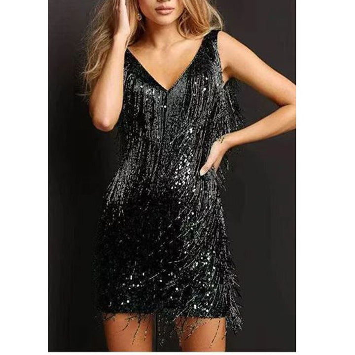 Robe mini Celina glamour à paillettes brillantes et franges, idéale pour une fête ou cocktail.