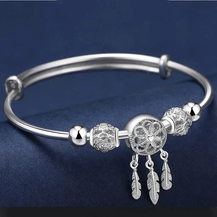 Bijou femme: bracelet attrape-rêves en argent 925 avec détails plumes, un classique raffiné.