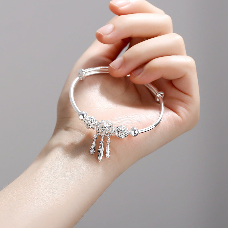 Bracelet élégant et symbolique pour femme, attrape-rêves en argent 925, idéal pour toutes occasions.