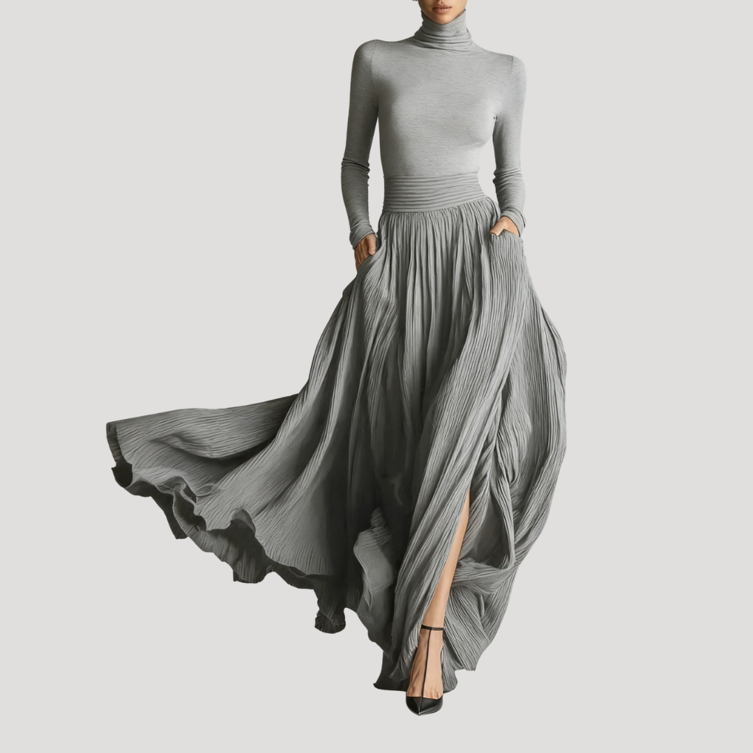Robe plissée élégante femme, silhouette fluide longue, manches longues. Parfaite pour événements formels.
