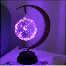 Lampe design lune en verre borosilicaté, cadeau idéal, ambiance lumineuse unique.