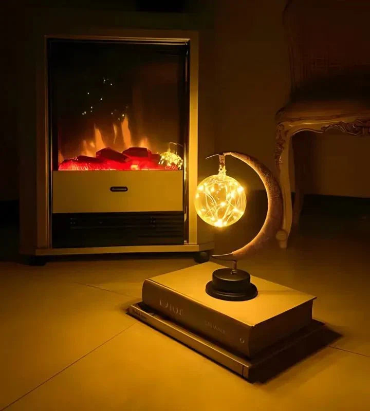 Lumière de table lune rêveuse en verre borosilicaté transparent, ambiance cosy.