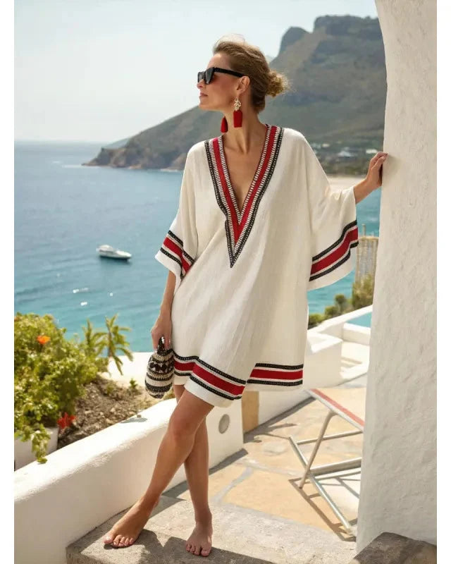Mini robe kaftan femme fluide et légère avec col V, manches courtes, idéale pour la tenue décontractée d'été.
