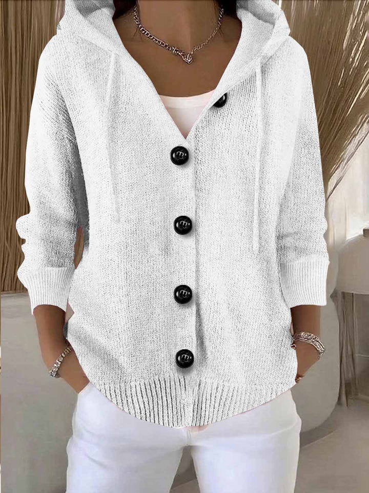 Cardigan femme ample à capuche, doux et chaud. Confort élégant pour journées décontractées ou soirées mi-saison.