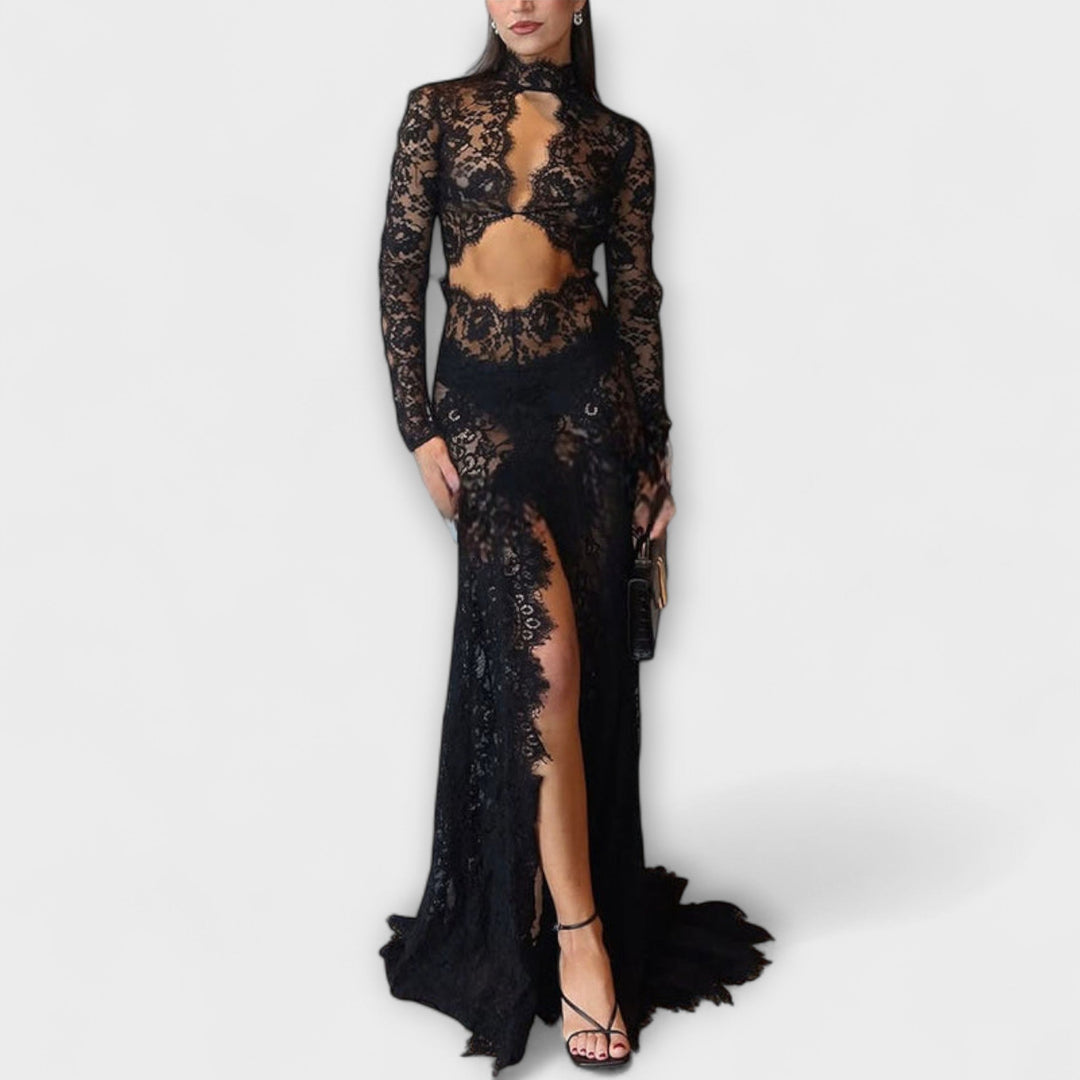 Robe longue transparente noire élégante à découpes, manches longues, parfaite pour soirée chic femme tendance.