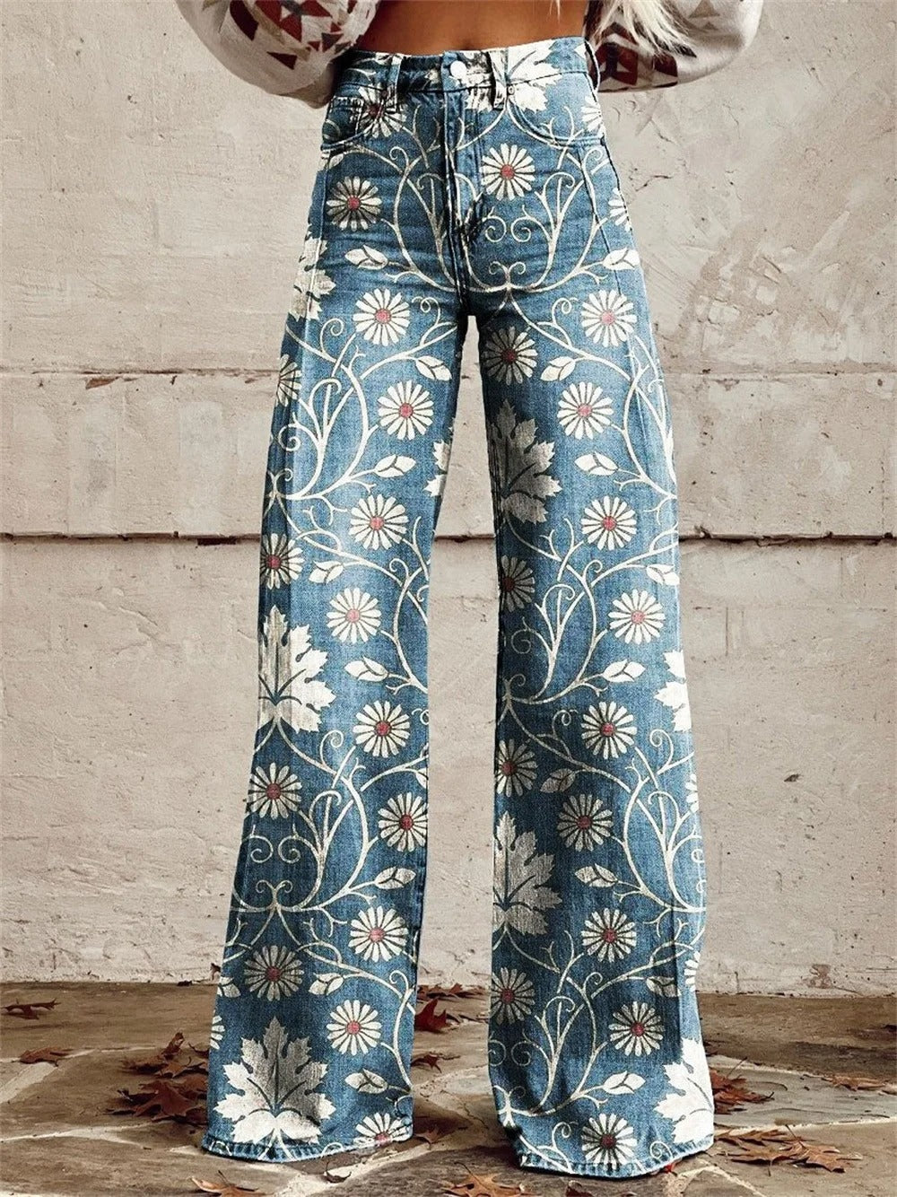 Pantalon large taille haute femme à motif floral, idéal pour un look été élégant et décontracté.