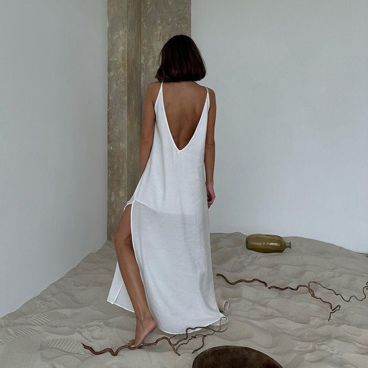 Vêtements femme: Robe longue blanche minimaliste et confortable, un incontournable de l'été.