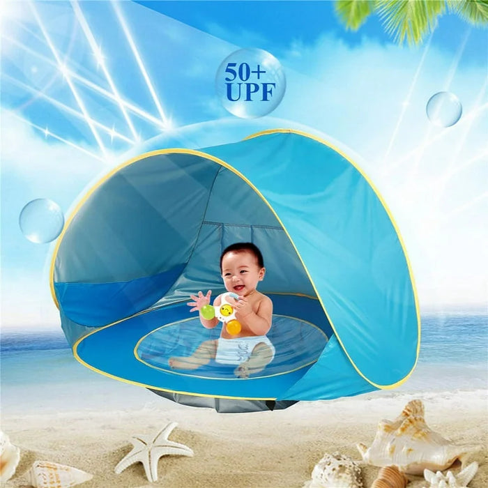 Tente de plage pop-up anti-UV pour enfants, facile à transporter, offrant une protection solaire optimale pour bébé.